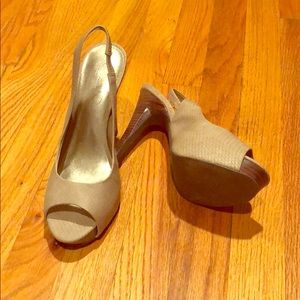 Tan faux snakeskin peep toe heels with sling back.